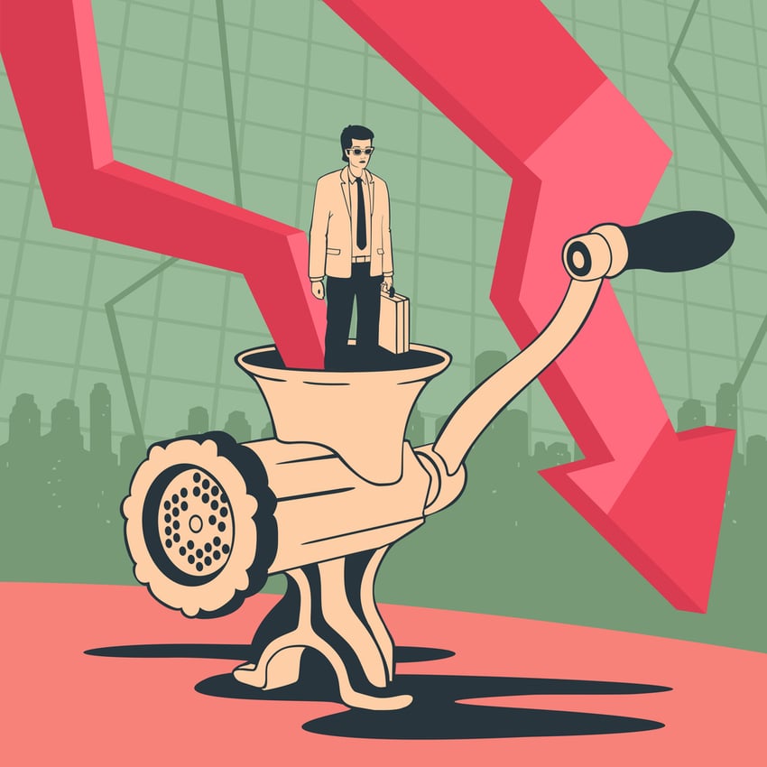 Male executive caught in a meat grinder as market declines, symbolizing lack of operational discipline and market unpreparedness